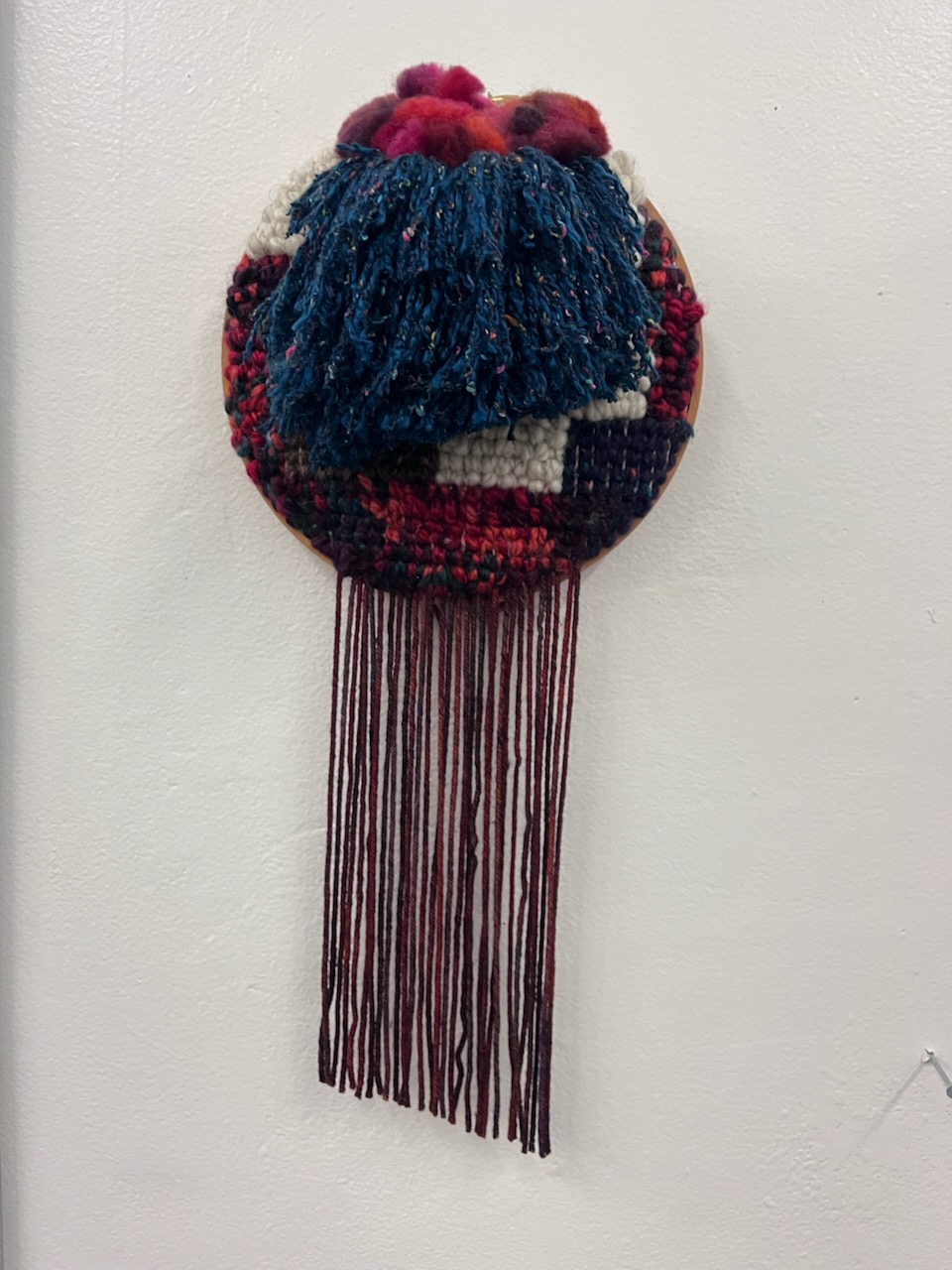 Pamela Ybañez - Fire Bloom - Wool on Latch - Hook Canvas and hoop - $400